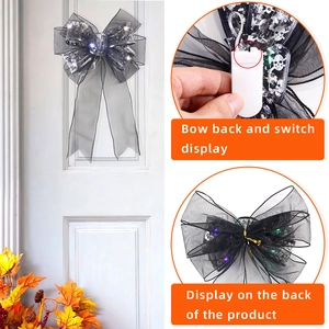 Halloween LED ghost bow with silver skull print on black ribbon and mesh for party decor