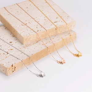 Three-color double-layered butterfly pendant necklaces in gold, silver, and rose gold finishes