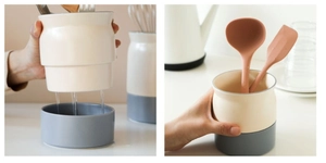 Detail view of beige and gray ceramic cutlery holder showing drainage base and kitchen use