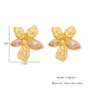 Detailed view of gold flower earrings with marquise stones and measurements