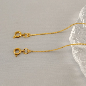Elegant gold zircon letter pendant necklace with fine chain and spring ring clasp