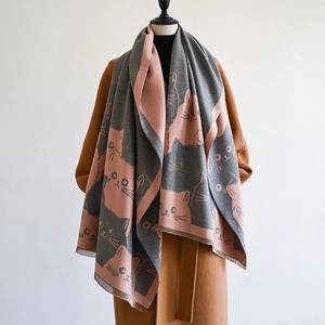 Detail of cute cat pattern on pink and dark grey double-sided thick cashmere scarf