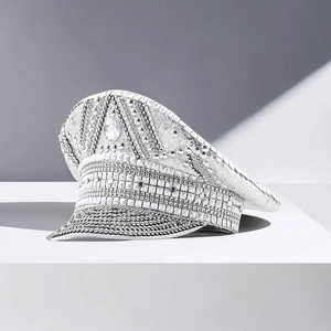 Close-up of sparkling silver sequins and crystal rhinestones on festive captain hat
