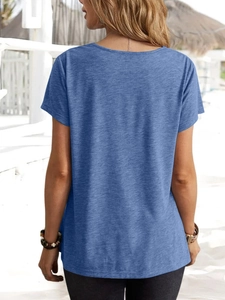 Detail of blue short-sleeved t-shirt with textured heather fabric shown from the back