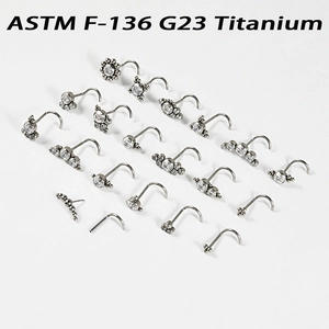 Set of G23 titanium nose studs with cubic zirconia in floral and geometric shapes