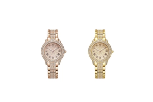 Detail van luxe dameshorloges met strassteentjes in goud en roségoud met Romeinse cijfers