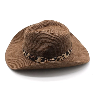 Brown woven straw western cowboy hat with leopard print ribbon and curved brim