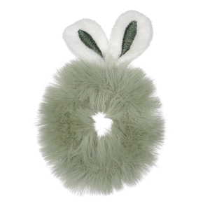Close-up of sage green plush scrunchie with cute white rabbit ear decorative details