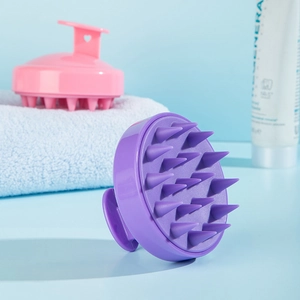 Silicone scalp massagers in purple and pink with ergonomic soft bristles for hair cleaning