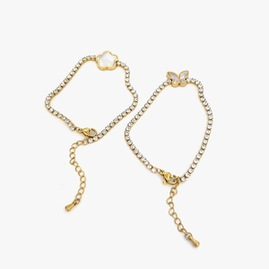 Bracelet vintage français plaqué or 18K avec papillon en nacre blanche et fleurs en zircone