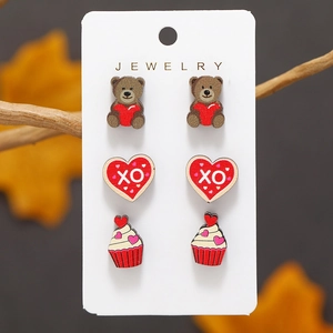 Three-pair Valentine wood earring set featuring teddy bear, heart with XO, and cupcake