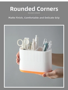 Close-up of dual-color desk organizer showing matte texture and rounded corners