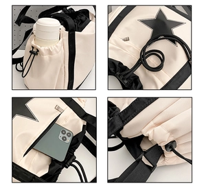 Detail of shoulder bag featuring side pocket for phone and water bottle storage