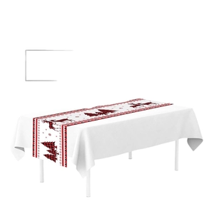 Christmas table runner featuring red plaid reindeer and tree patterns on white fabric