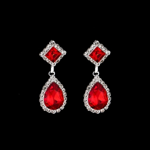 Elegant silver drop earrings with red teardrop gems and sparkling crystals for bridal jewelry