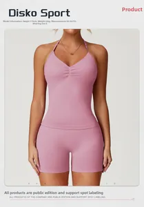 Pink halter yoga tank top and high-waist shorts set on model with detailed size info