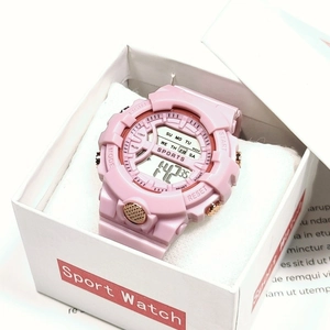 Pink digital sports watch with rose gold accents in a white display gift box