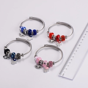 Stainless steel evil eye bead bracelet with hamsa hand charm in four colors and size ruler