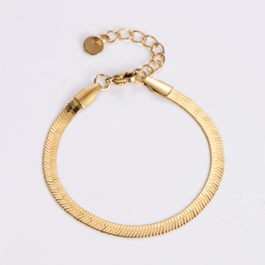Detail of 4mm flat gold snake chain bracelet with lobster clasp and adjustable link