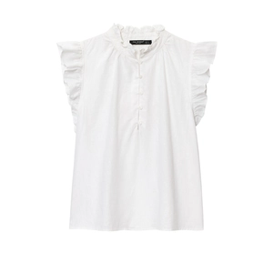 Détails du col montant à volants et patte de boutonnage sur chemise en coton blanc