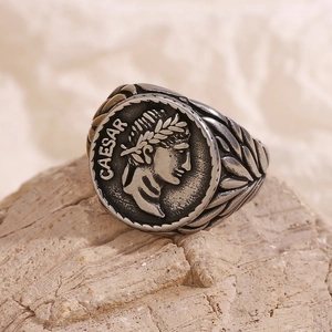 Vintage stainless steel Caesar coin ring with laurel leaf relief in silver finish