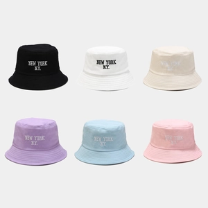 Cotton bucket hats with New York embroidery in black, white, beige, purple, blue, and pink