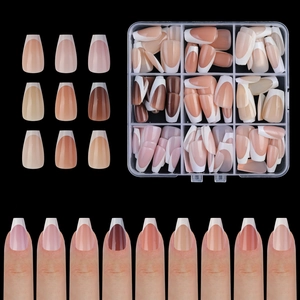 French tip press-on nails in nude and brown shades with storage box display
