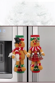 Close-up of plush gingerbread man refrigerator handle covers with festive Christmas details