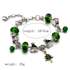 Christmas charm bracelet with green glass beads, festive tree and gift box pendants