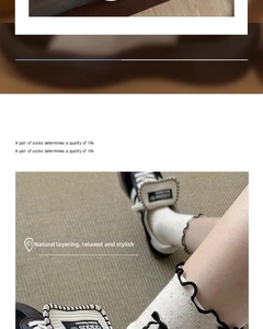 Detail of white crew socks with black ruffled edges and polka dots styled with sneakers