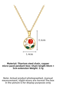 Detail of gold titanium steel necklace with red tulip pendant and white pearl accents