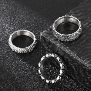 Men's retro stainless steel punk rings with skull, dot, and tire tread textures