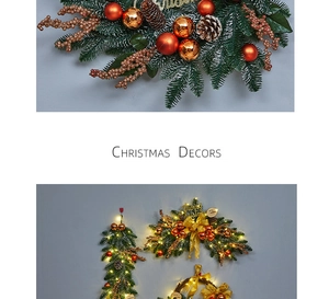 Detail of Christmas garland with warm LED lights, pine cones, and orange ornaments