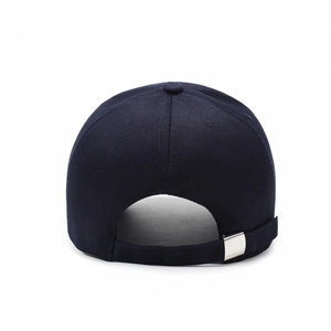 Classic navy cotton baseball cap with adjustable metal buckle on white background