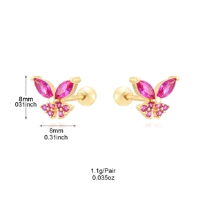 Macro view of gold butterfly stud earrings with pink zircon and S925 silver hallmarks