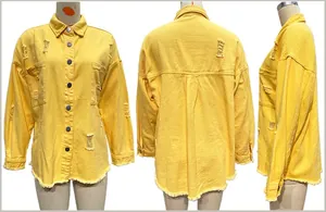 Detailed view of the yellow distressed denim jacket with frayed edges and ripped design