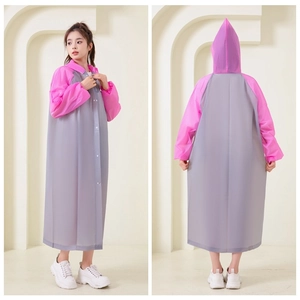 Detail view of thickened EVA raincoat with gray body and pink contrast hooded sleeves