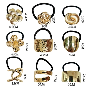 Minimalist gold alloy hair tie set with nine geometric and floral designs on white background