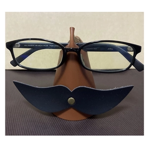 Creative mustache-shaped leather glasses holder stand for desk and office storage