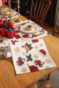 Close-up of festive Christmas table runner with thick cotton linen texture and holiday print