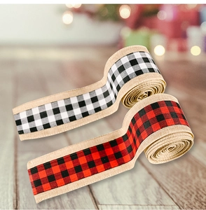 Detail of Christmas burlap ribbons in black white and red black buffalo plaid patterns