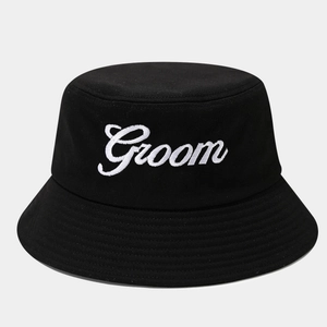 Close-up of Groom embroidery on black cotton bucket hat with clean stitching details