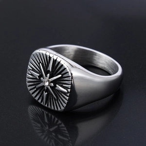 Punk style stainless steel cross star ring with zircon stone on black reflective surface