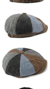 Detail of multi-color patchwork octagonal newsboy cap showing textured wool fabric