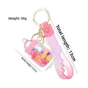 Pink milk bottle keychain with size labels 13cm length and 5.5cm bottle height