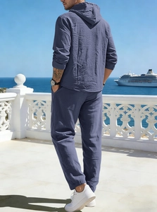 Detailed texture of men's blue linen hooded long sleeve set for summer vacations