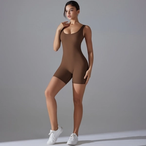 Detail view of high-stretch brown yoga bodysuit with V-waist and peach butt lifting design