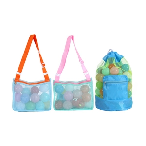 Detailed comparison of three mesh beach toy storage bags in various colors and styles