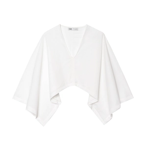 Haut court en lin blanc avec col en V et manches kimono évasées au style épuré et minimaliste