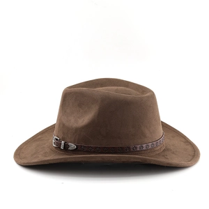 Detailed view of dark brown cowboy hat with decorative embossed leather band and silver buckle
